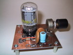 12/2000: A very simple 6T9 Compactron 2-stage audio amp, on a Dremel-hacked PC board. The whole project took a little over an hour.