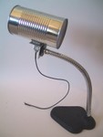 10/2002: The Tin Can Bandwidth Expander, a Wi-Fi directional antenna made from a Hunt's spaghetti sauce can and a goose neck lamp base