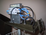 9/2002: Inside the ammo box Wi-Fi bridge unit, showing the AP and the power splitter.